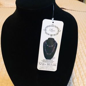 Velvet necklace stand.